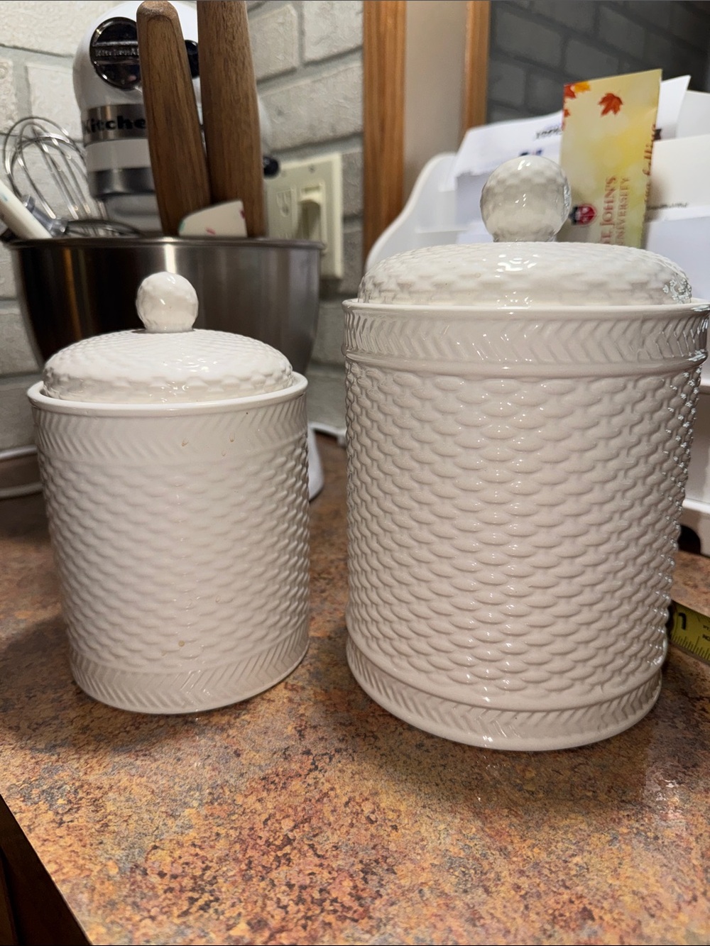 2 white basket weave Canisters